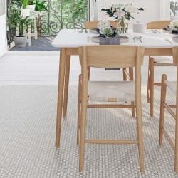 Bright kitchen with white wood floors