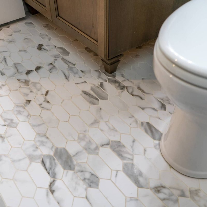 Stylish patterned marble tile flooring in a bathroom