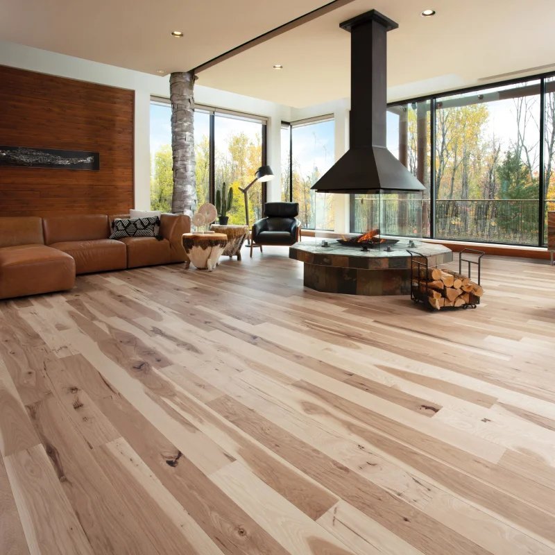 Rustic hardwood flooring in an open concept living room